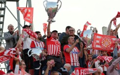 Girona booked their place in next season's Champions League with a 4-2 win over Barcelona on May 4