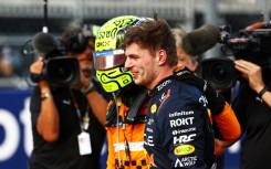 'Iconic track': Max Verstappen (R) with Lando Norris after the British driver won the Miami Grand Prix 