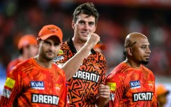 Sunrisers Hyderabad's captain Pat Cummins (centre)