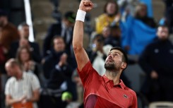 Winning moment: Novak Djokovic celebrates vicotry over Pierre-Hugues Herbert