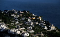 Capri, an island in Italy's Bay of Naples, draws vast numbers of day-trippers in summer months