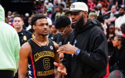 Bronny James, left, was selected by the Los Angeles Lakers with the 55th pick in the NBA Draft and could become the first NBA father-son combination playing for the Lakers alongside his superstar father, LeBron James, right