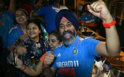 Fans celebrate after India wins the ICC Men's T20 World Cup final cricket match against South Africa, in New Delhi on June 29, 2024