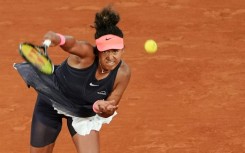 'Game for grass': Naomi Osaka in action against Iga Swiatek at the recent French Open 
