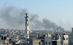 Smoke rises over Shejaiya suburb in Gaza City