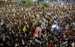 Israeli anti-government protesters in Tel Aviv on July 6, 2024 during a demonstration demanding action to release the hostages taken captive by Palestinian militants in the Gaza Strip in the October 7 attacks