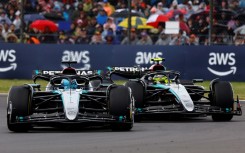 Mercedes' drivers Lewis Hamilton and George Russell (L) competing at the Formula One British Grand Prix at Silverstone