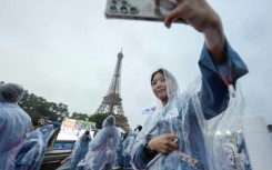 As the South Korean delegation rode a boat on the Seine River, the French-speaking presenter introduced them using the official name for North Korea