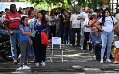 Venezuelan President Nicolas Maduro reacts after results were announced in Caracas in the country's presidential election, in which Maduro was declared the winner and opposition groups protested