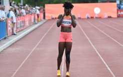 Jamaica's Shericka Jackson reacts after pulling up in a race in Szekesfehervar, Hungary on July 9