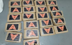The 25 packages of cocaine that Hurricane Debby blew onto a beach in the Florida Keys are seen in this US Border Patrol photo obtained August 5, 2024