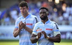 Siya Kolisi (R) joined Racing 92 after lifting a second Rugby World Cup 