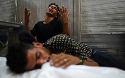 Palestinians in Khan Yunis, southern Gaza, mourn a relative killed during an Israeli strike -- more than 40,000 people have been killed in Gaza since war began on October 7, 2023, according to the Hamas-run territory's health ministry