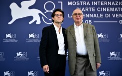 Legendary US documentary director Errol Morris (R) and US journalist Jacob Soboroff before the premiere of "Separated" at the Venice Film Festival