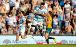 Joaquin Oviedo dives over to score as Argentina thrashed Australia