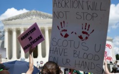 Abortion rights demonstrators rally in Washington in June 2023 to mark the first anniversary of the US Supreme Court ruling overturning the federal right to an abortion