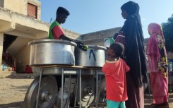 As famine threatens displaced Sudanese, a UN report says woman are particularly vulnerable