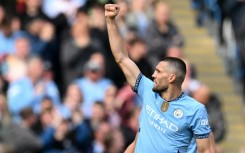 Manchester City midfielder Mateo Kovacic celebrates after scoring against Fulham