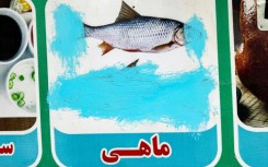 Images of living things, including a fish at a restaurant in Lashkar Gah in Helmand province, are often censored in Afghanistan since the Taliban takeover 