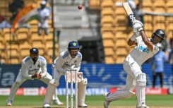 New Zealand's Rachin Ravindra said he was proud to have scored a century with his father watching from the stands in the first cricket Test against India in Bengaluru