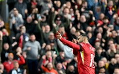 Mohamed Salah celebrates scoring in Liverpool's 2-1 win over Chelsea