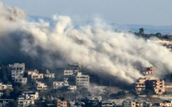 Smoke rises from the site of an Israeli air strike that targeted the southern Lebanese border village of Khiam 