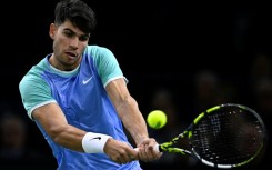 Carlos Alcaraz won his opener at the Paris Masters 7-5, 6-1