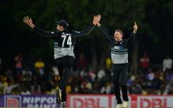 Lockie Ferguson (right) celebrates his hat-trick against Sri Lanka in the second T20 in Dambulla