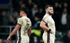 Backs to the wall: Disappointment for Marcus Smith (L) and Luke Cowan-Dickie after England's 29-20 defeat at the hands of South Africa at Twickenham