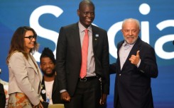 South African Foreign Minister Robert Lamola (C) attended the G20 Social event preceding the summit alongside Brazilian President Luiz Inacio Lula da Silva