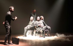 Actors perform on stage during the sixth edition of the Derna Festival, back after a pause due to the 2023 floods