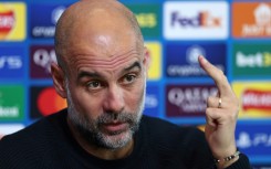 Manchester City manager Pep Guardiola speaks to the press ahead of his team's match against Feyenoord