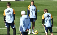 Real Madrid forward Kylian Mbappe (L) takes part in a training session ahead of the Getafe clash