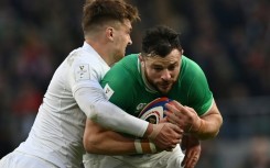 Ireland centre Robbie Henshaw in action against England