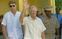 Former president Carter traveled to Port-au-Prince to meet with electoral authorities about Haiti's December 1990 general elections