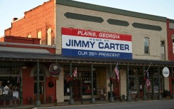 A sign has long hung in downtown Plains, Georgia heralding Jimmy Carter as the 39th president
