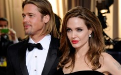 Brad Pitt and Angelina Jolie have signed off on a divorce settlement