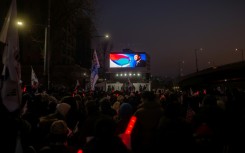 A portrait of impeached South Korean President Yoon Suk Yeol is seen at a rally to support him
