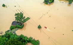 In July, heavy rains caused by Typhoon Gaemi flooded villages in China's Hunan province                