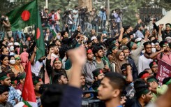 Students and supporters shout slogans during a 'March for Unity' organised by the Anti-Discrimination Student Movement in Dhaka on New Year's eve