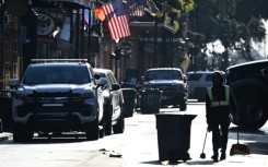 A city worker cleans in New Orleans after the New Year's truck attack