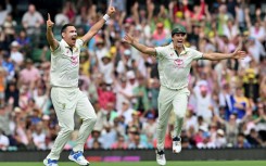 Australia Scott Boland (L) and Pat Cummins celebrate during the fifth Test against India in Sydney