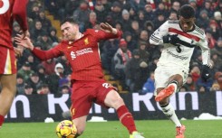 Amad Diallo (R) equalised 10 minutes from time as Manchester United earned a point at Anfield