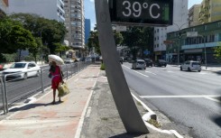 A thermometer shows a temperature of 39 degrees Celsius (102.2 F) in Sao Paulo, Brazil on March 17, 2024