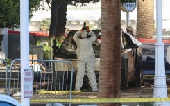 Investigators photograph the Cybertruck where Matthew Livelsberger shot himself before it exploded