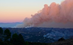 Smoke billows from the Palisades fire
