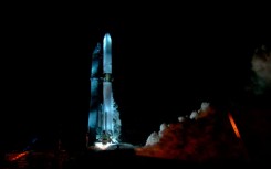 The New Glenn rocket is seen during a hot fire test at the Cape Canaveral Space Force Station in Cape Canaveral, Florida on December 27, 2024