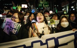 Young women and supporters of liberal causes like the LGBTQ+ community, climate justice and labour rights are calling for the impeached president's immediate detention