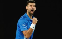 Novak Djokovic reacts after a point against Czech Republic's Tomas Machac 