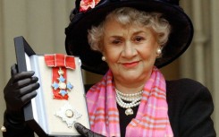Actress Joan Plowright after being made a Dame at Buckingham Palace in 2004